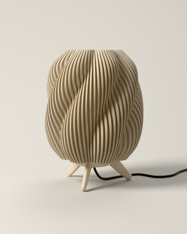 Swirl-lamp in Zand overdag: de lamp is uit, zacht daglicht op de gedraaide ribbels